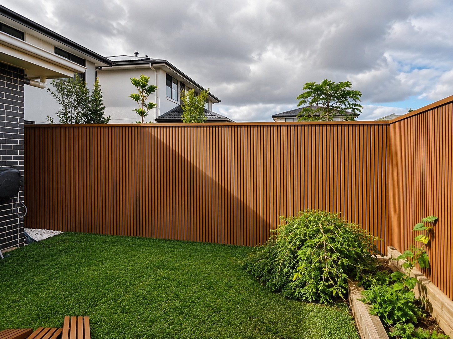 Timber slat privacy fence