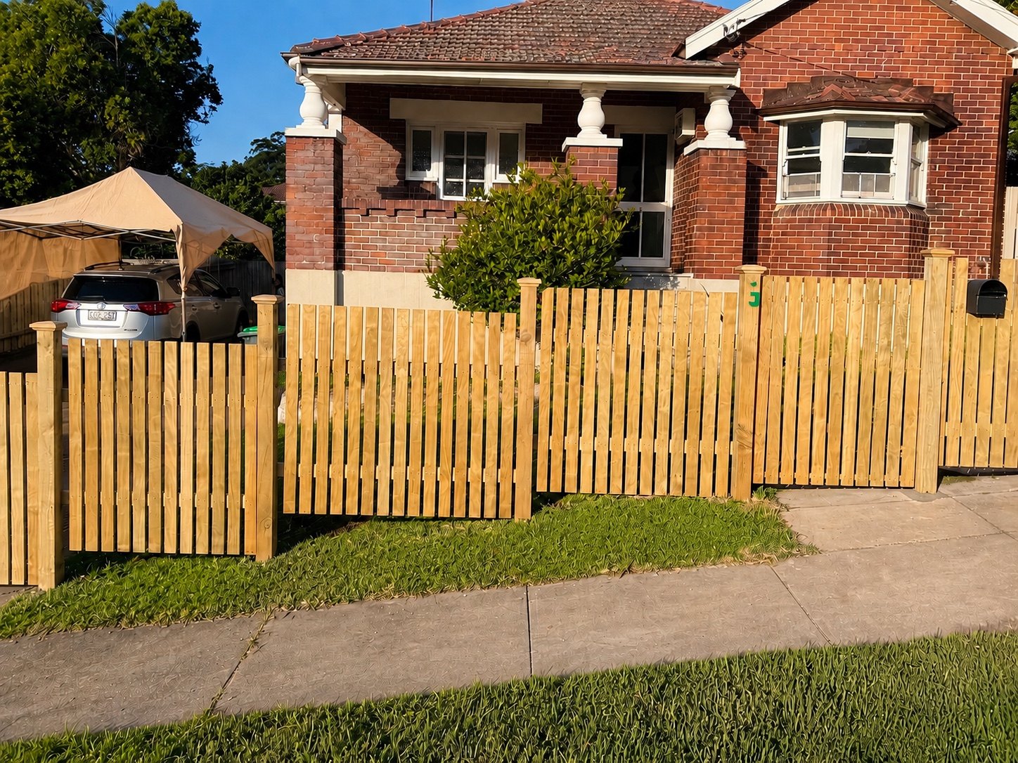 Grey horizontal slat privacy fence