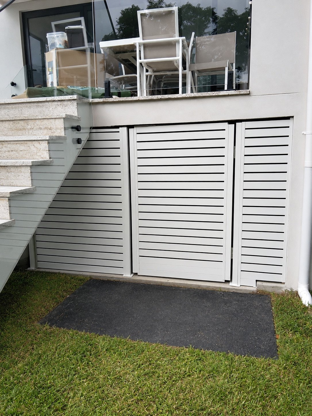 White horizontal slat gate installation